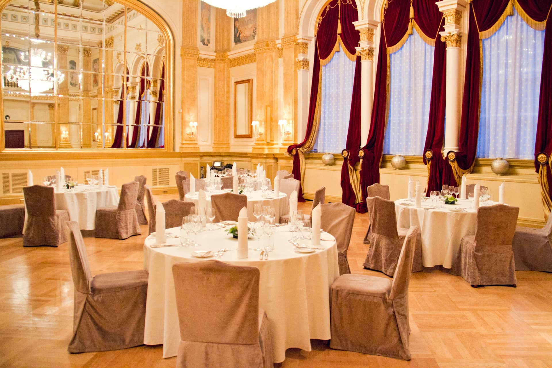 Hotel Kämp mirror hall set with round tables for a private dinner