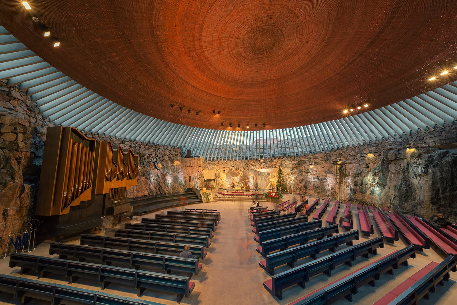 Temppeliaukio Rock Church in Helsinki, copper dome over walls of bare rock